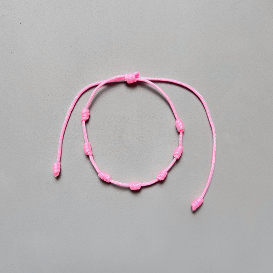 PULSERA 7 NUDO ROSA