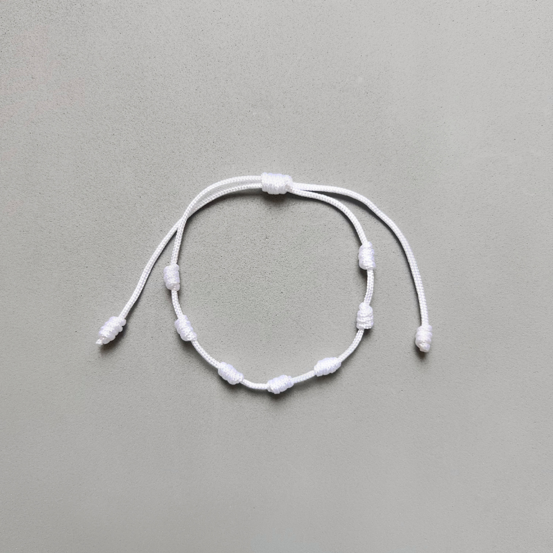 PULSERA DE 7 NUDOS BLANCO