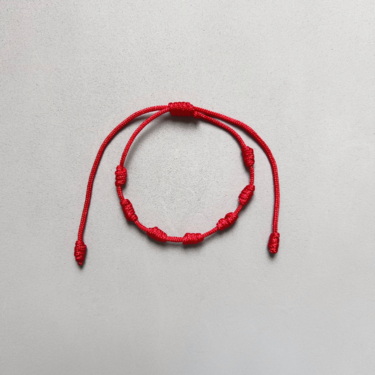 PULSERA DE 7 NUDOS ROJO